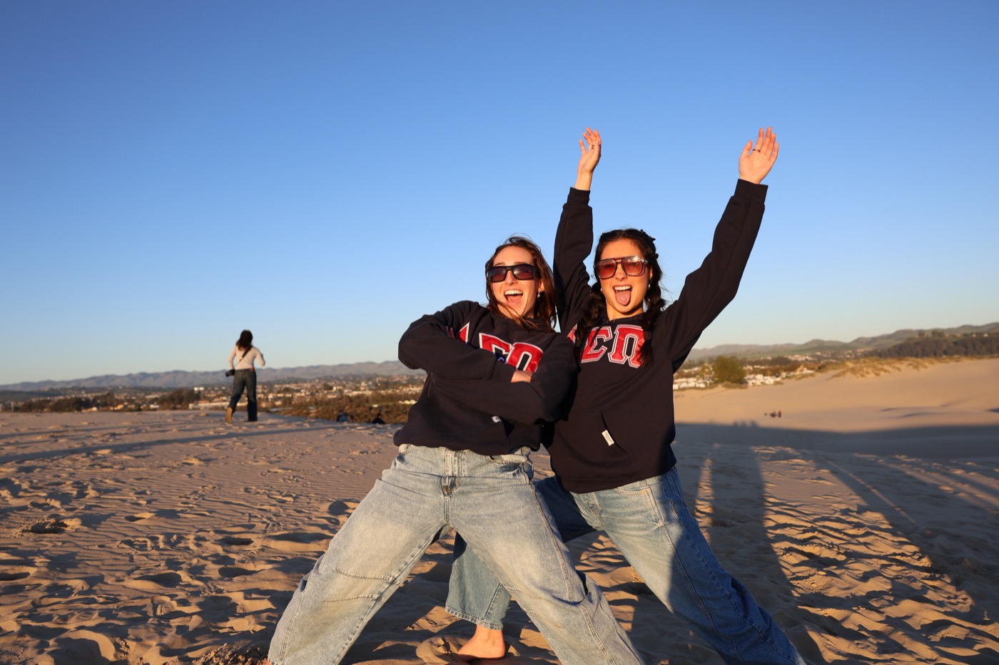 Brothers in ASP hoodies at the dunes